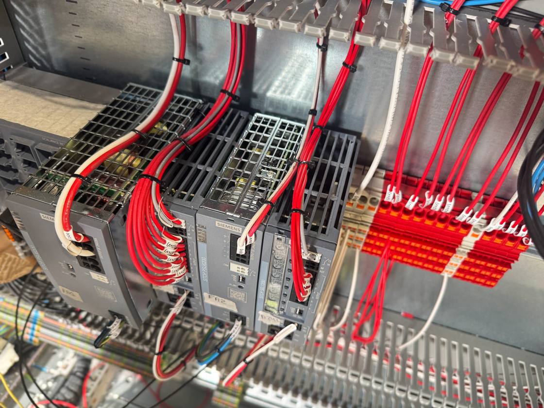 Siemens power supply modules and wiring of an electrical cabinet being assembled